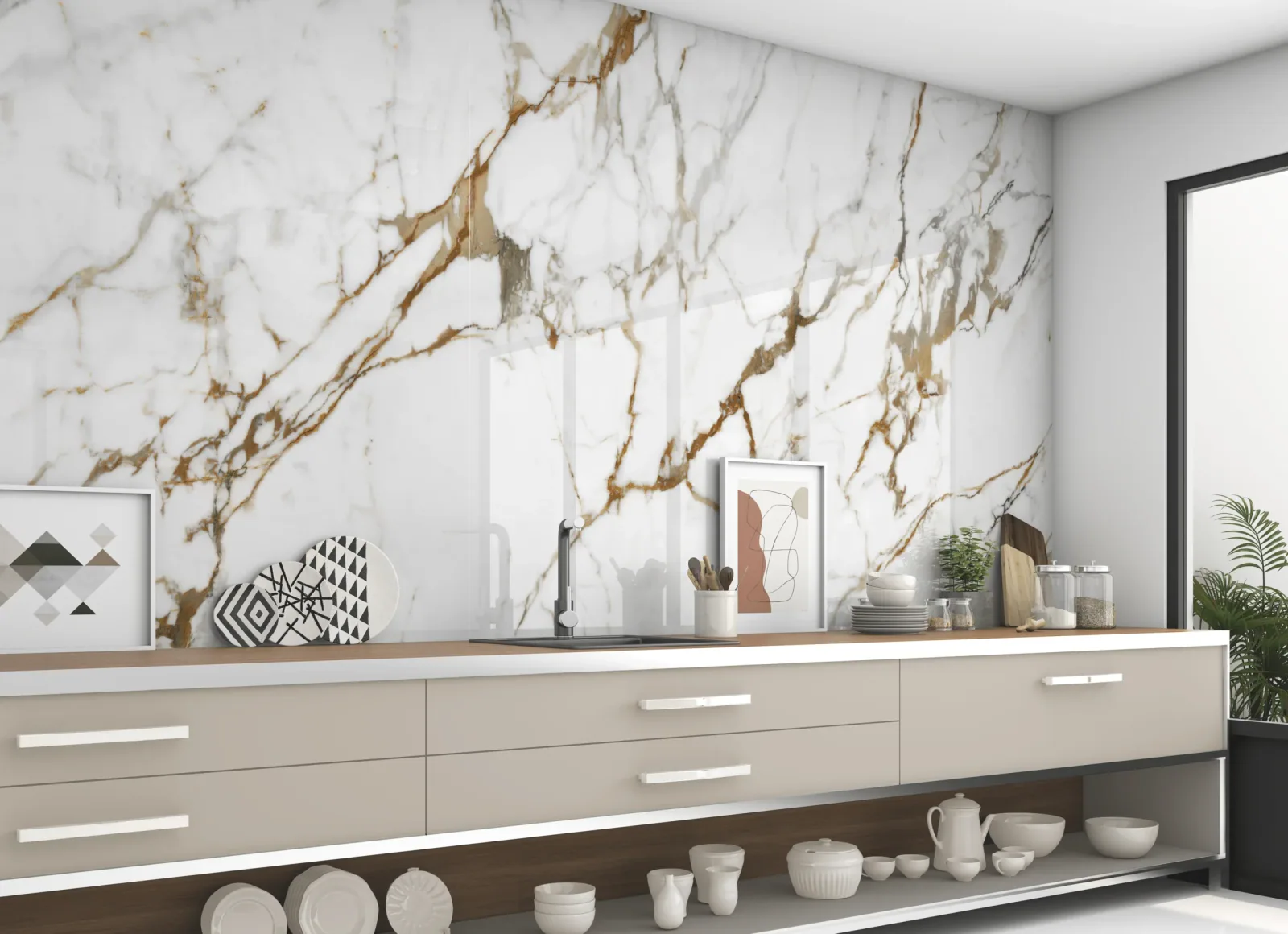 Calacatta Gold marble kitchen backsplash above a run of cabinetry