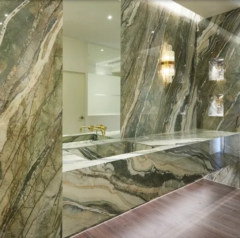 Green quartzite bathroom feature wall behind a freestanding bathtub