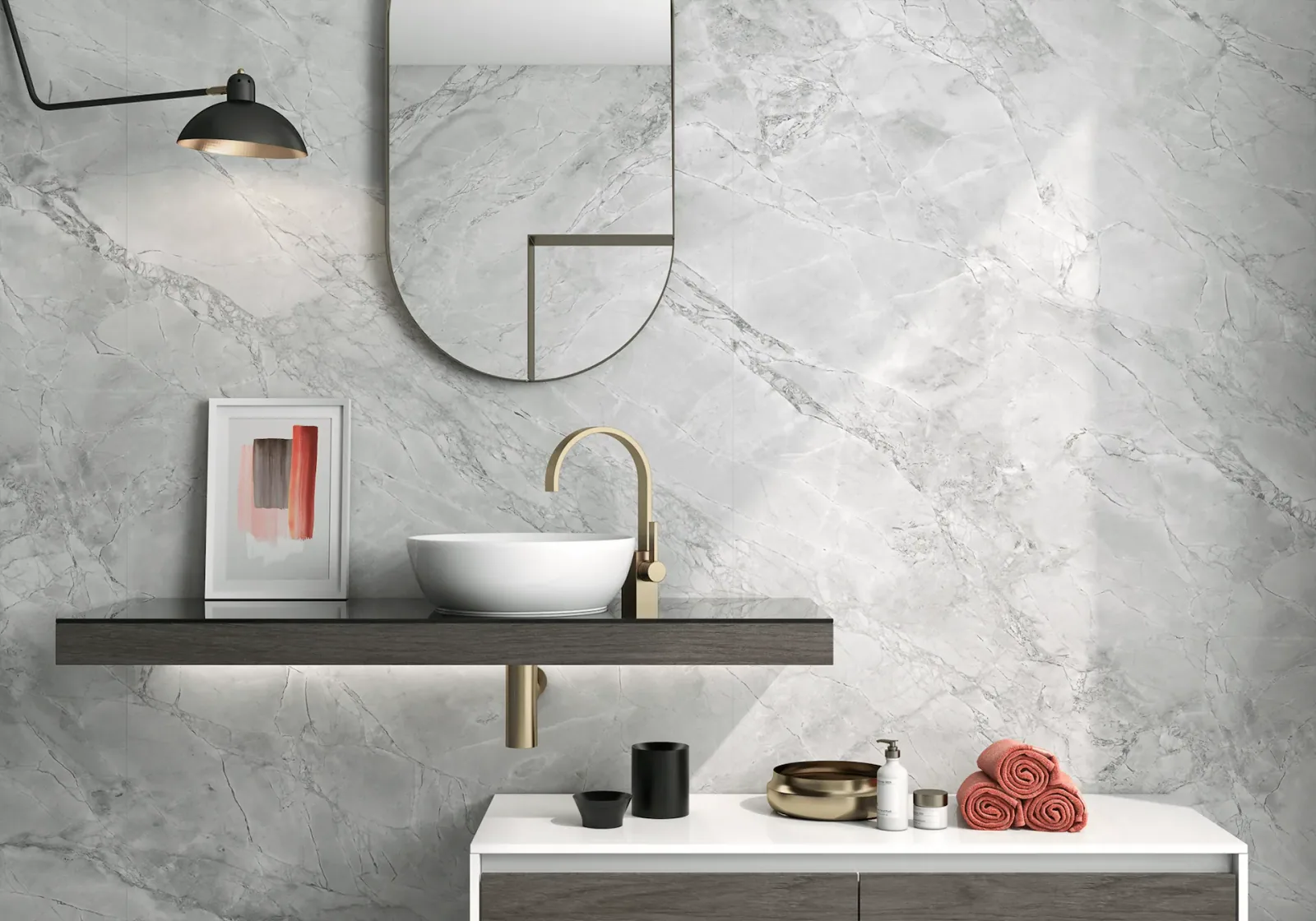 Grey marble bathroom vanity top with a brushed gold tap